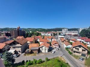 a view of a town with houses and buildings at City Vibe Apartment in Tuzla