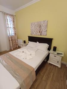 Postel nebo postele na pokoji v ubytování Adrys Boutique Villa