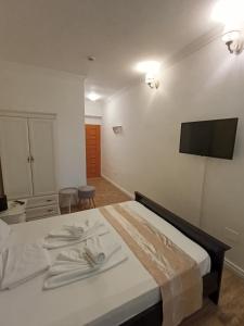 Postel nebo postele na pokoji v ubytování Adrys Boutique Villa