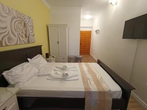 Postel nebo postele na pokoji v ubytování Adrys Boutique Villa