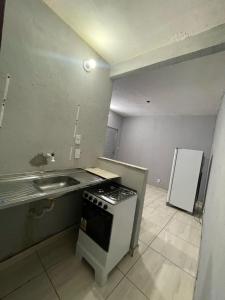 Kuchyň nebo kuchyňský kout v ubytování Hostel do Porto