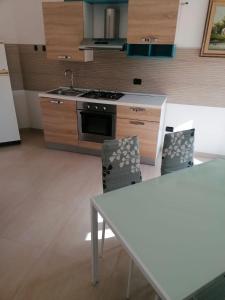 Η κουζίνα ή μικρή κουζίνα στο Casa Luys, San Donato di Lecce
