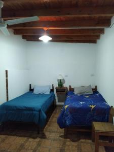 Postel nebo postele na pokoji v ubytování La Soñada de la 40