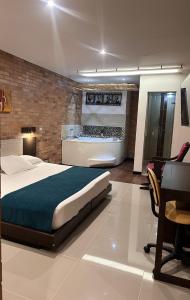 Postel nebo postele na pokoji v ubytování Hotel Toscana Oriente