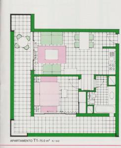 a floor plan of a house with pink and green at Hotel Vila Galé Cascais T1 542 in Cascais