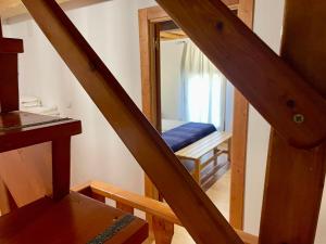 Postel nebo postele na pokoji v ubytování Casa Rural Jim Morrison