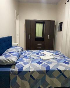 Postel nebo postele na pokoji v ubytování Casa-apartamento aconchegante com 3 quartos e 2 banheiros