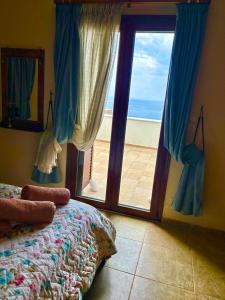 Posteľ alebo postele v izbe v ubytovaní Athevillas Chrysoula
