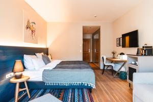 TV a/nebo společenská místnost v ubytování HENRI Country House Kitzbühel