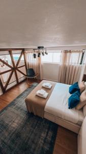 Giường trong phòng chung tại Cardal Luxury by SpotOn Apartments