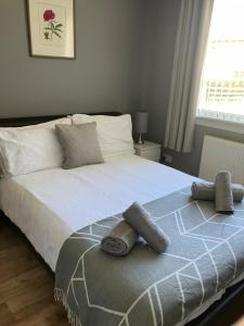 Ένα ή περισσότερα κρεβάτια σε δωμάτιο στο Esna