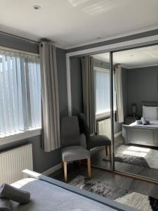 Ένα ή περισσότερα κρεβάτια σε δωμάτιο στο Esna