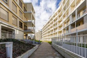 an empty alley between two apartment buildings at Terrace&RelaxStudio free parking in Bratislava