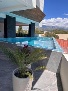 Swimmingpoolen hos eller tæt på Hermoso Departamento