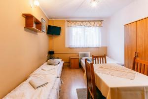 Posteľ alebo postele v izbe v ubytovaní Pokoje Gościnne U Babci