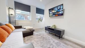 Μια τηλεόραση ή/και κέντρο ψυχαγωγίας στο Luxury in the heart of Brighton