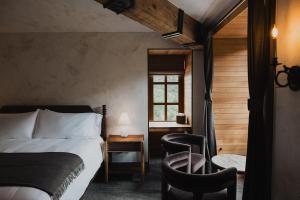 Postel nebo postele na pokoji v ubytování Surf Hotel & Chateau