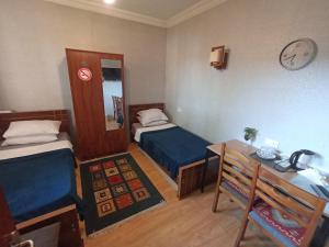 Postel nebo postele na pokoji v ubytování Rose House