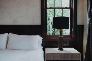 Postel nebo postele na pokoji v ubytování Surf Hotel & Chateau