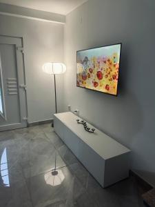 Televízia a/alebo spoločenská miestnosť v ubytovaní House Burić