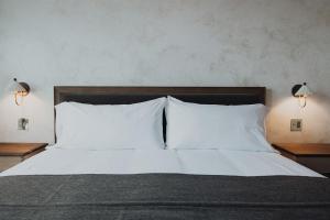 Postel nebo postele na pokoji v ubytování Surf Hotel & Chateau