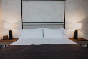 Postel nebo postele na pokoji v ubytování Surf Hotel & Chateau