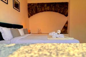 Ένα ή περισσότερα κρεβάτια σε δωμάτιο στο Como Lake View Enjoy&Relax +10 φωτογραφίες