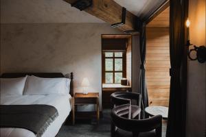 Postel nebo postele na pokoji v ubytování Surf Hotel & Chateau