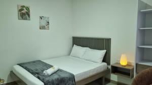 Voodi või voodid majutusasutuse Hotel Fuente Real Popayán toas