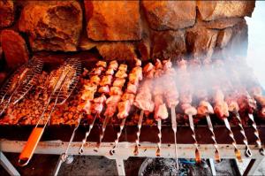 a grill with meat and other foods on it at Sagamo in Sagamo