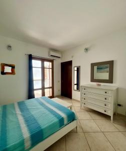 Postel nebo postele na pokoji v ubytování Appartamento situato nella galleria dello Shopping