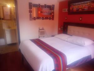 Letto o letti in una camera di Hotel Cusco Museo