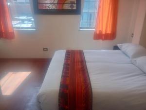 Letto o letti in una camera di Hotel Cusco Museo
