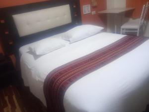 Letto o letti in una camera di Hotel Cusco Museo