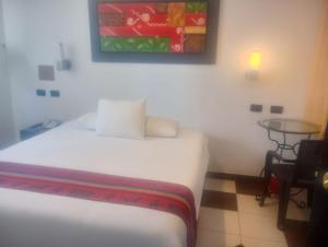 Letto o letti in una camera di Hotel Cusco Museo