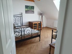 Postel nebo postele na pokoji v ubytování Statek U Šimla