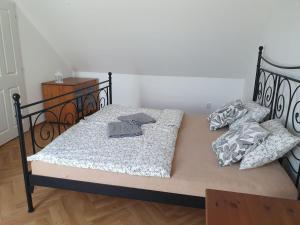 Postel nebo postele na pokoji v ubytování Statek U Šimla