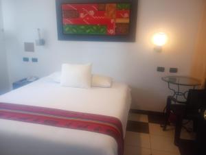Letto o letti in una camera di Hotel Cusco Museo