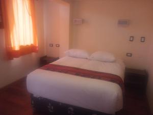 Letto o letti in una camera di Hotel Cusco Museo