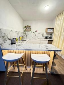Η κουζίνα ή μικρή κουζίνα στο Loft Emadi Ayacucho