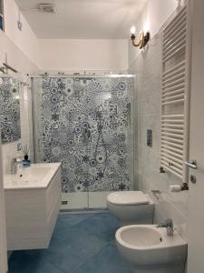 Koupelna v ubytování Ginevra Apartment