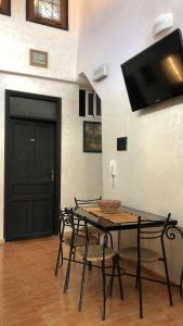 TV a/nebo společenská místnost v ubytování Dar DAROUNE