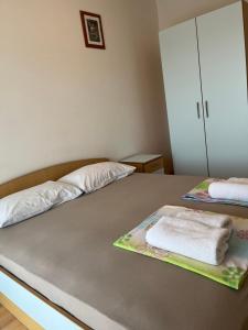 Posteľ alebo postele v izbe v ubytovaní Apartments Dada