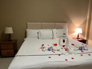 Postel nebo postele na pokoji v ubytování Enjoy Hotel