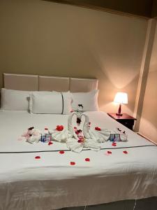 Postel nebo postele na pokoji v ubytování Enjoy Hotel