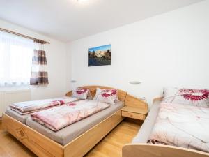 Posteľ alebo postele v izbe v ubytovaní Bichl Viehofen