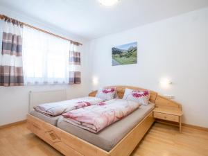 Posteľ alebo postele v izbe v ubytovaní Bichl Viehofen
