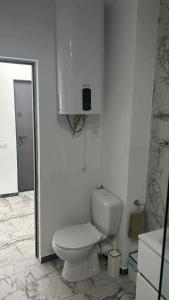 Et badeværelse på Costinești Apartament