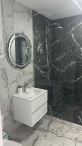 Et badeværelse på Costinești Apartament