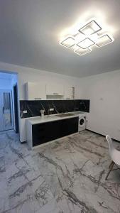 Køkken eller tekøkken på Costinești Apartament + 2 billeder